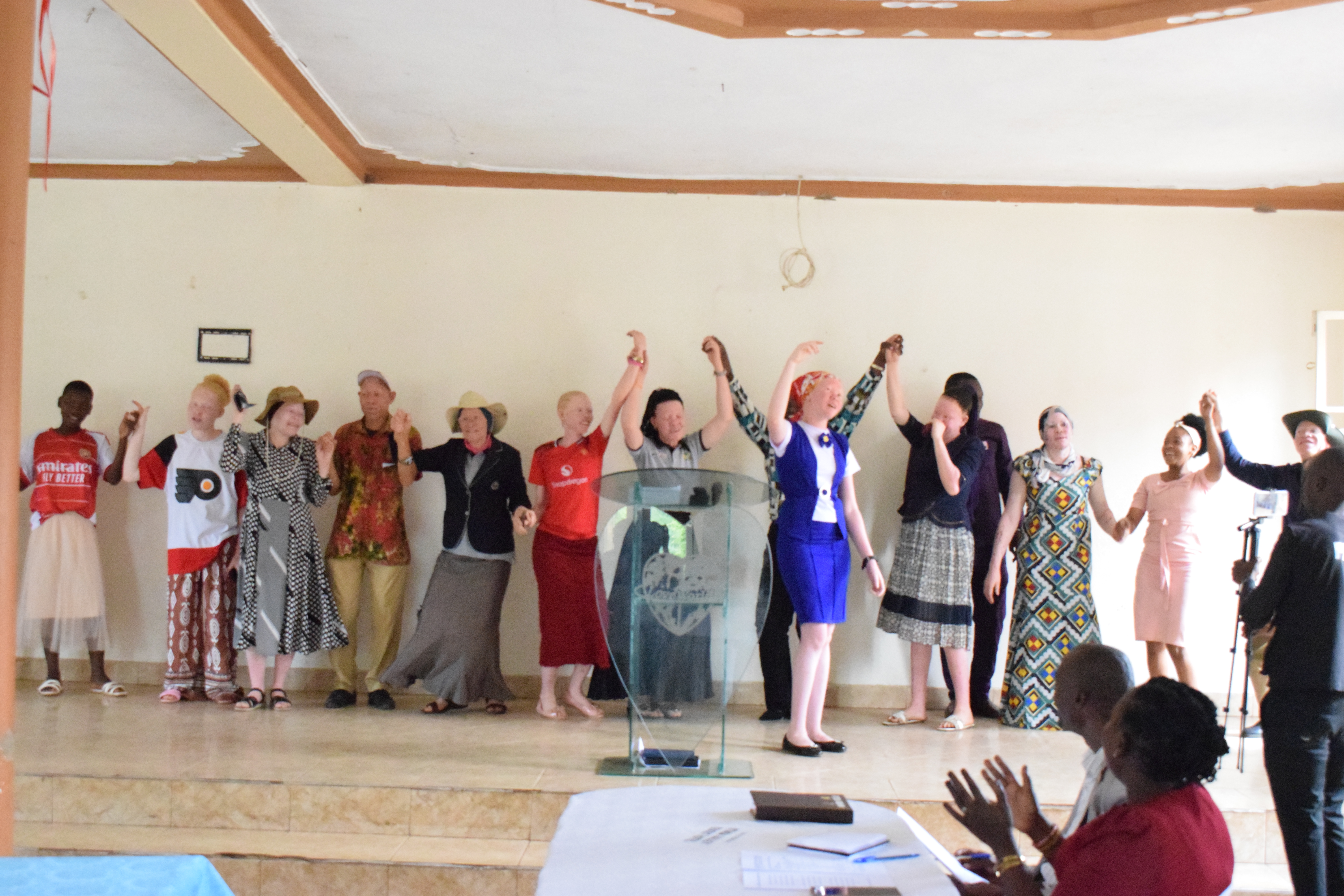 Woman with albinism running a small livestock farm in Uganda
